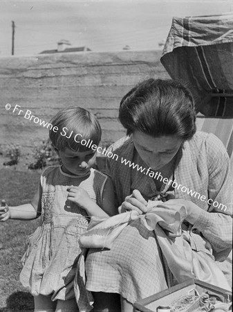 'HELPING MAMMA' MARGARET WHITE WITH HER MOTHER HELEN